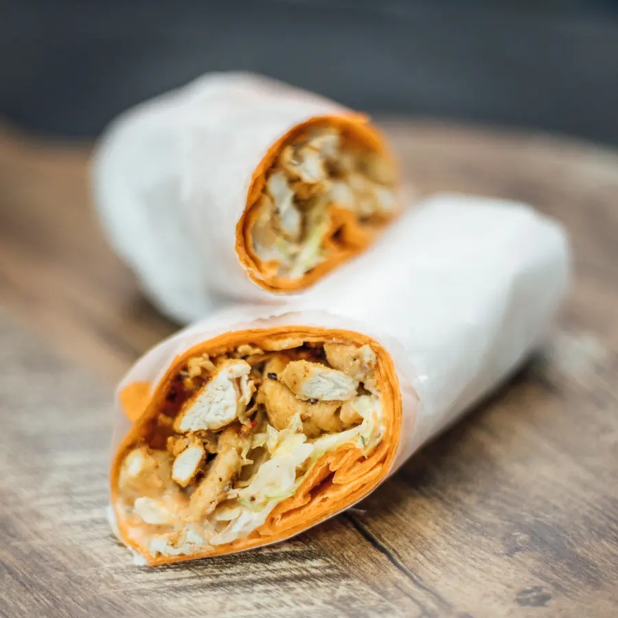 Chicken shawarma wrap cut in half